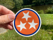 Load image into Gallery viewer, Sticker | 74O | Orange TN Flag Circle | Waterproof Vinyl Sticker | White | Permanent | Glitter