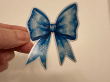 Load image into Gallery viewer, Sticker |  | Blue Snowflake Bow | Waterproof Vinyl Sticker | White | Clear | Permanent | Removable | Window Cling | Glitter | Holographic