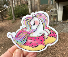 Load image into Gallery viewer, Sticker | 40i | Unicorn in Donut Float | Waterproof Vinyl Sticker | White | Clear | Permanent | Removable | Window Cling | Glitter | Holographic