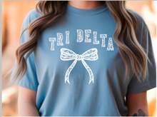 Load image into Gallery viewer, Comfort Colors Tee Tri Delta Lace Bow Available in S M L XL
