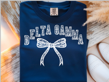 Load image into Gallery viewer, Comfort Colors Tee Delta Gamma Lace Bow Available in S M L XL