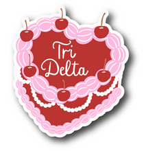 Load image into Gallery viewer, Sticker | DDD_C | Tri Delta Heart Shaped Cake | Waterproof Vinyl Sticker | White | Clear | Permanent | Removable | Window Cling | Glitter | Holographic